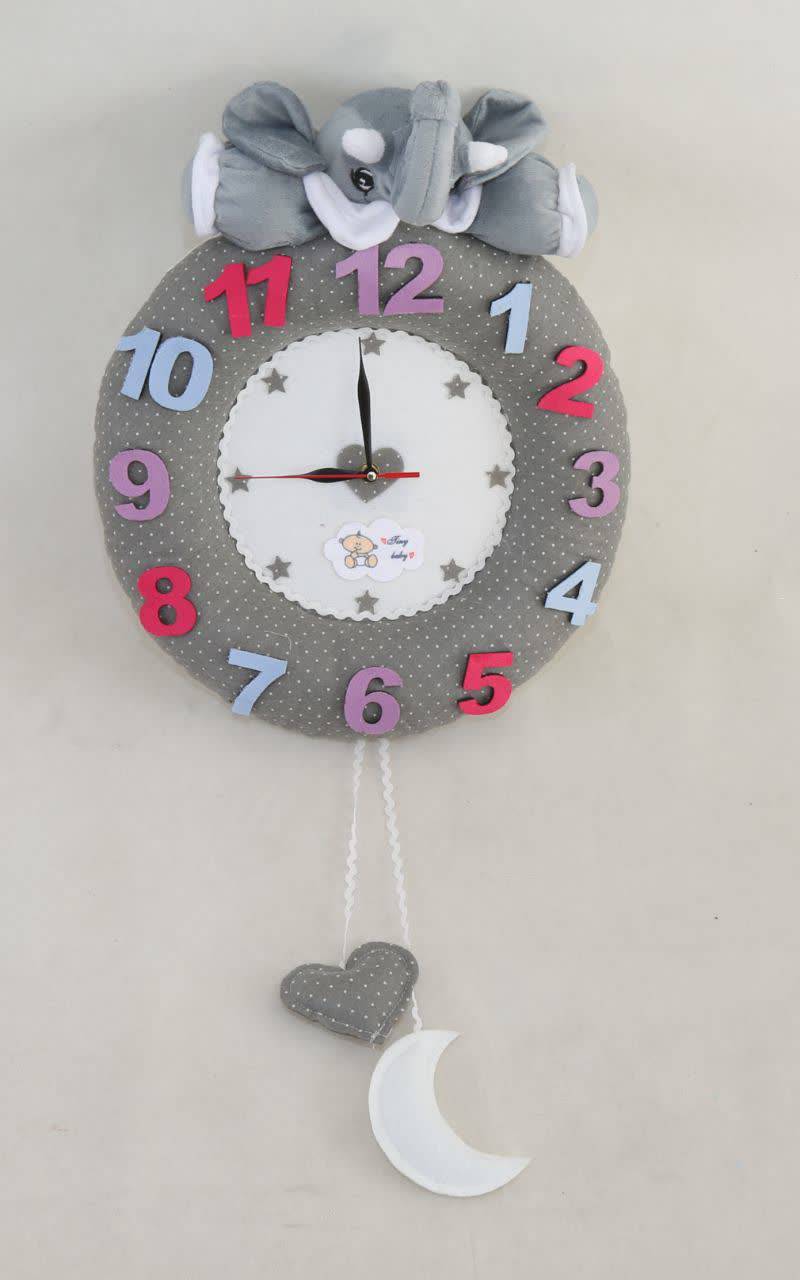 تولید ساعت دیواری عروسکی در مجموعه تولیدی سیسمونی عروسکی تاینی بیبی